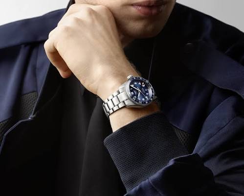 Homme →